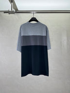 Two-tone short-sleeve T-shirt, back view in gray upper and black lower