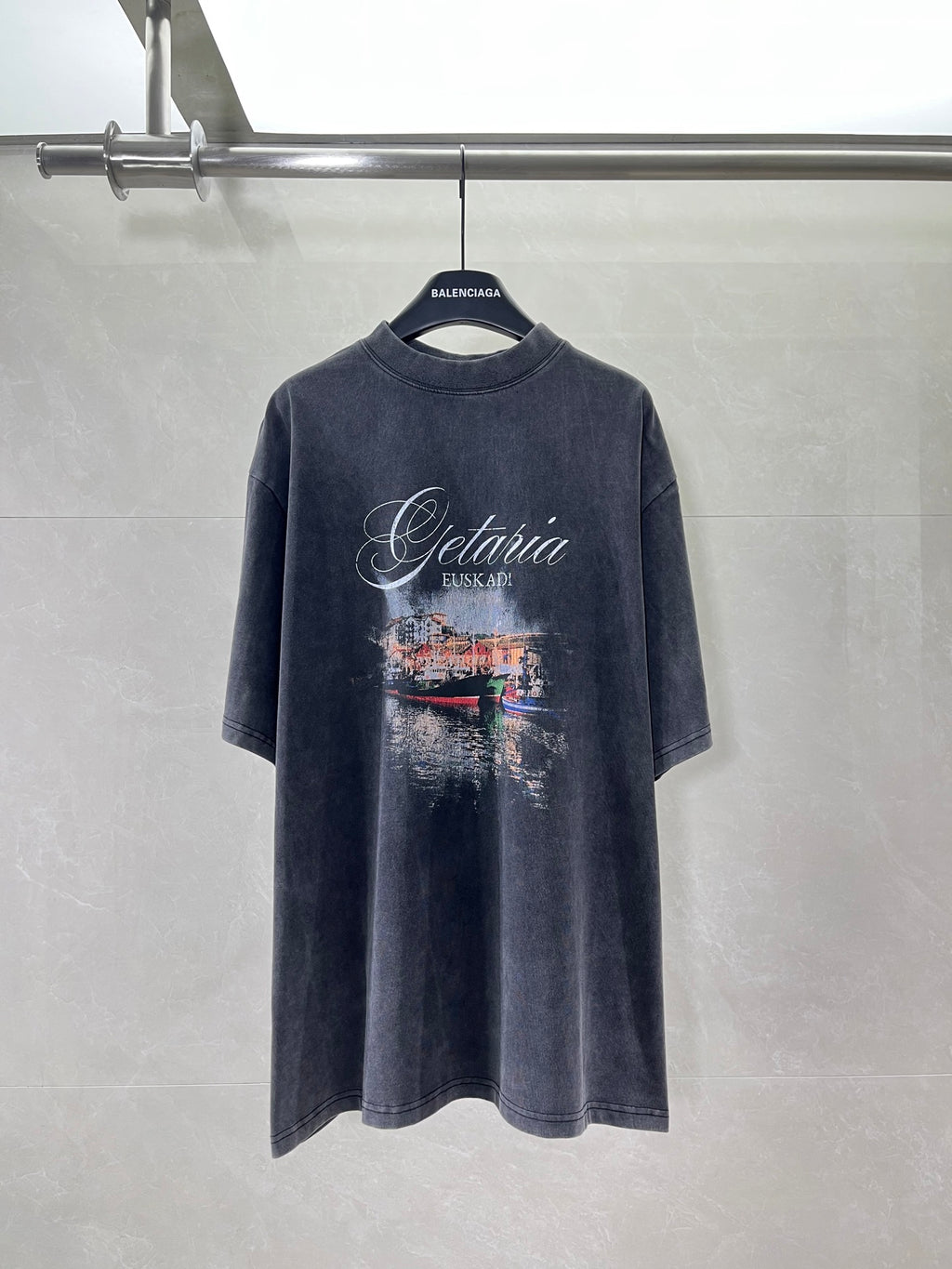 Navy crewneck T-shirt with large Getaria EUSKADI cityscape graphic on chest.