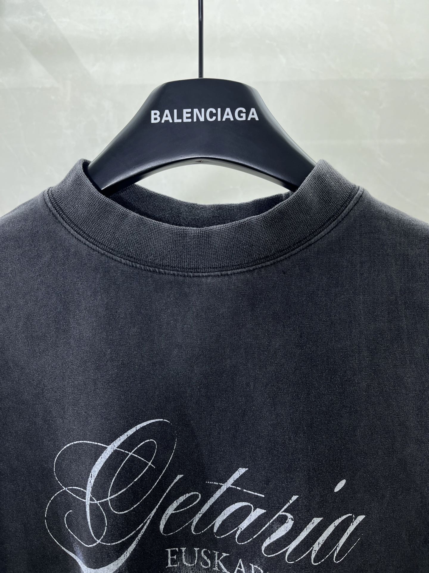 Navy crewneck T-shirt with BALENCIAGA logo on inner neck and Getaria print.