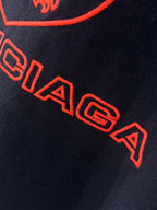 Navy Balenciaga T-shirt close-up of red 'BALENCIAGA' lettering