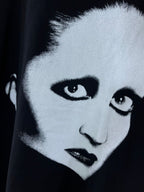 Black short-sleeve T-shirt with close-up white face and dark lips graphic