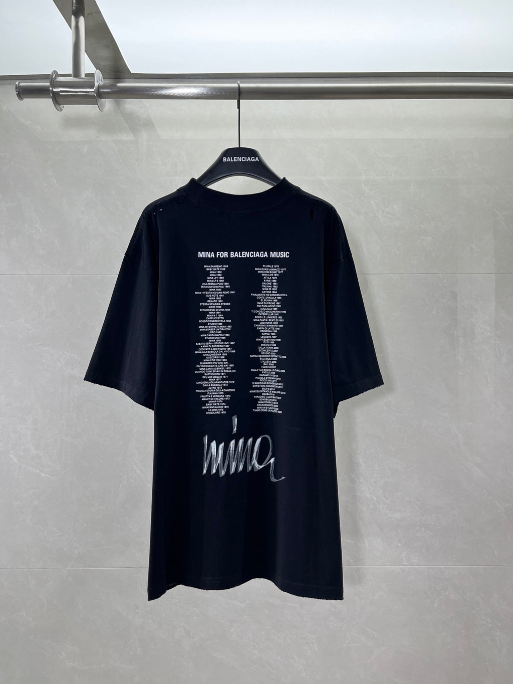 Black short-sleeve T-shirt with back typography text and Wings logo