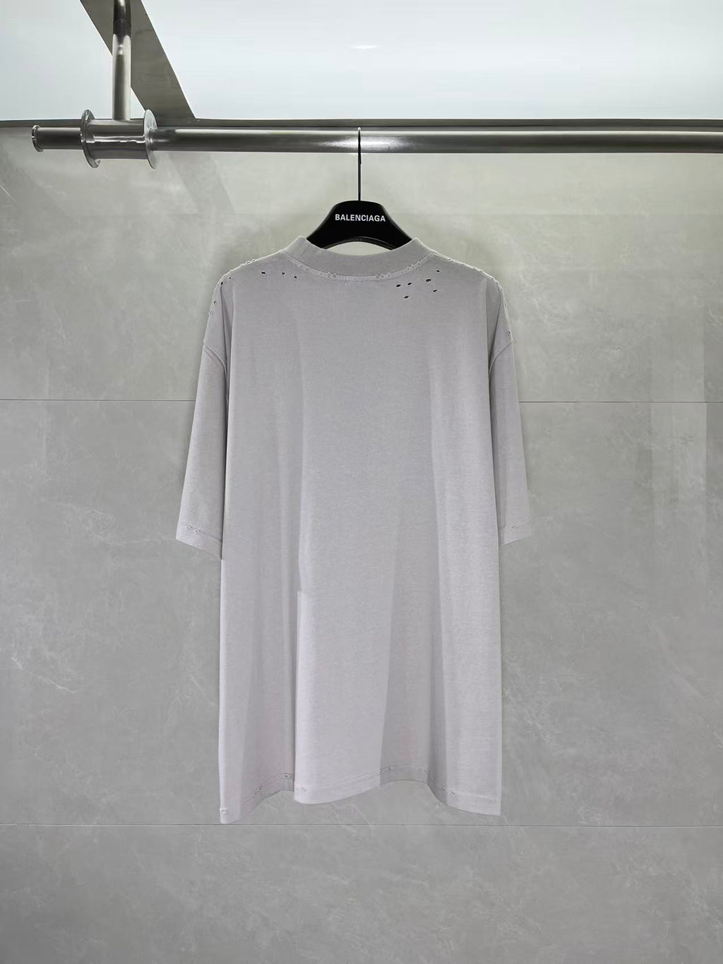 Balenciaga graphic T-shirt, light gray body with black logo print, crew neck