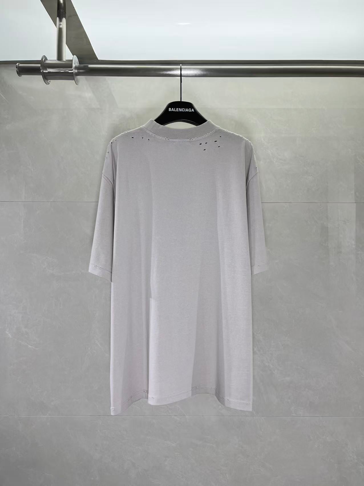 Balenciaga graphic T-shirt, light gray body with black logo print, crew neck