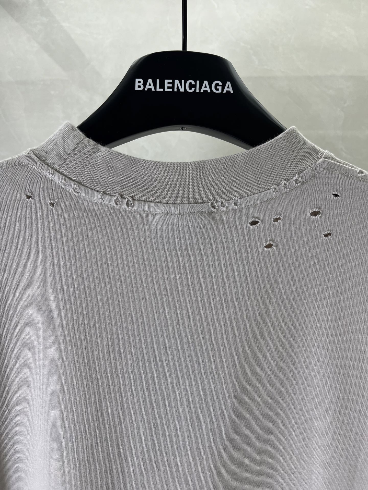 Balenciaga graphic T-shirt crew neck with small distressed holes, light gray