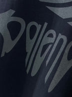 Navy Balenciaga T-shirt front logo graphic lettering close-up.