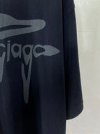 Navy Balenciaga T-shirt side view with front logo graphic detail.