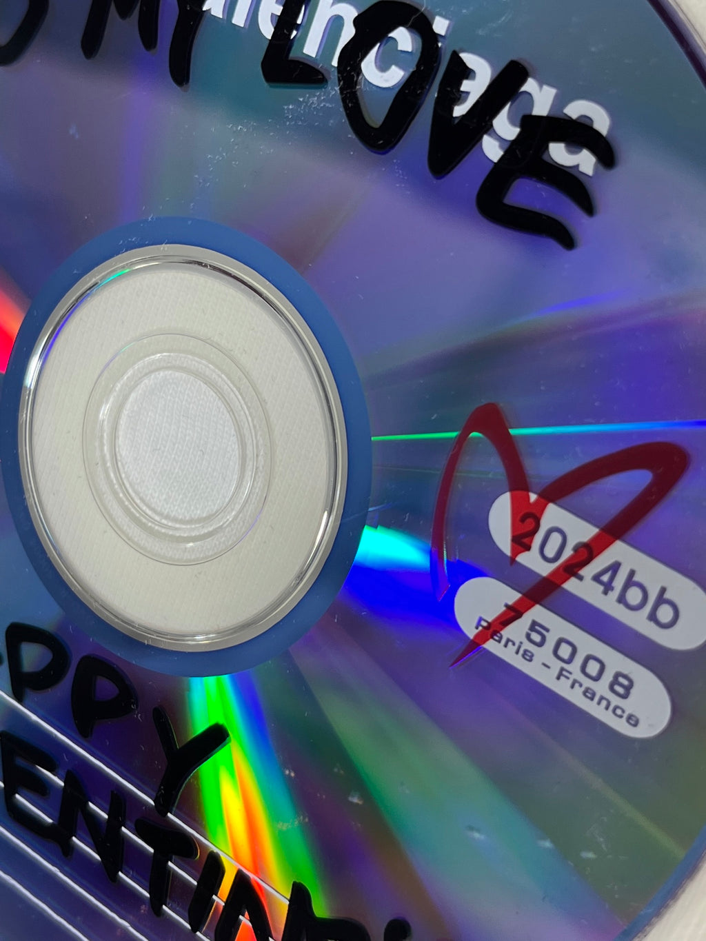 Close-up of colorful disc graphic on a white Balenciaga T-shirt