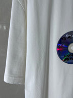 White Balenciaga T-shirt sleeve and side seam detail with part of the disc graphic