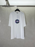White Balenciaga T-shirt with short sleeves and round neckline, featuring a colorful disc graphic