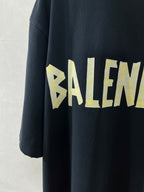 Balenciaga crewneck T-shirt, dark navy, large yellow BALENCIAGA word print