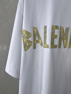 White crewneck Balenciaga T-shirt sleeve and chest graphic in gold lettering