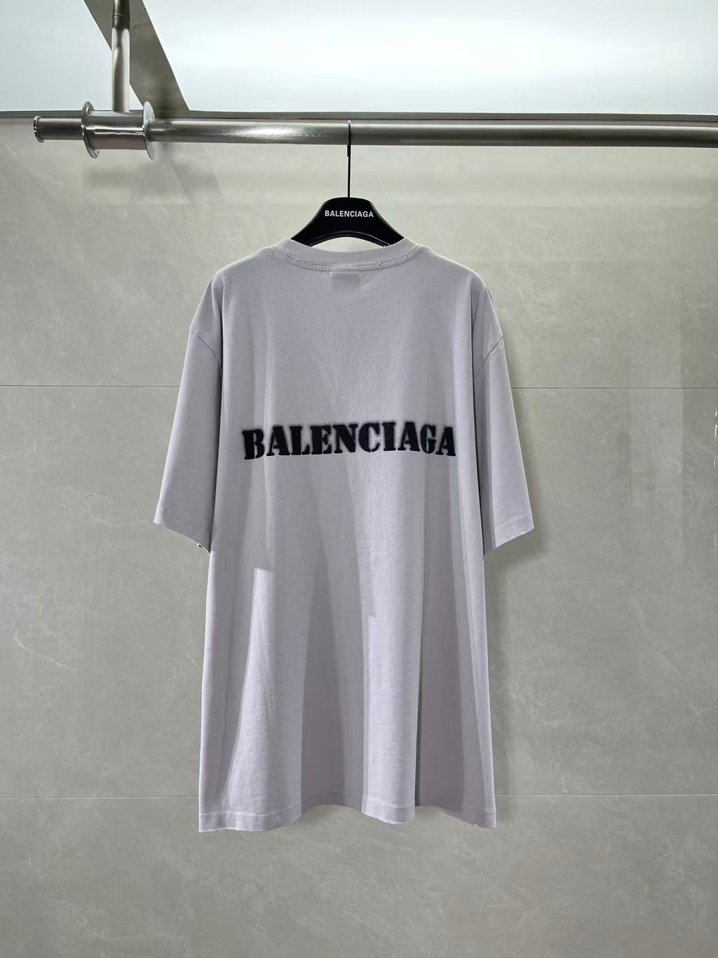 Light lavender Balenciaga T-shirt with black logo print on back, crew neck