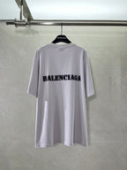 Light lavender Balenciaga T-shirt with black logo print on back, crew neck
