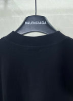 Black crew-neck T-shirt with short sleeves, plain back neckline
