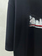 Black T-shirt with distressed white and red logo graphic