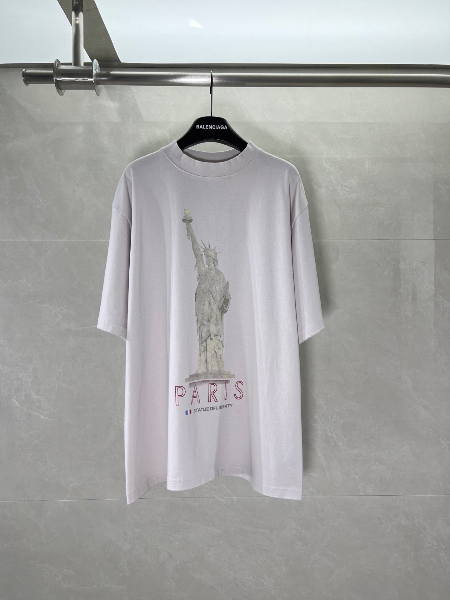 White Balenciaga T-shirt with large Paris graphic and statue print on the front