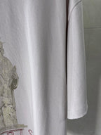 White Balenciaga T-shirt lower front with partial Paris typography graphic at left