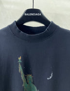 Navy Balenciaga crewneck T-shirt close-up of neckline and Statue of Liberty artwork
