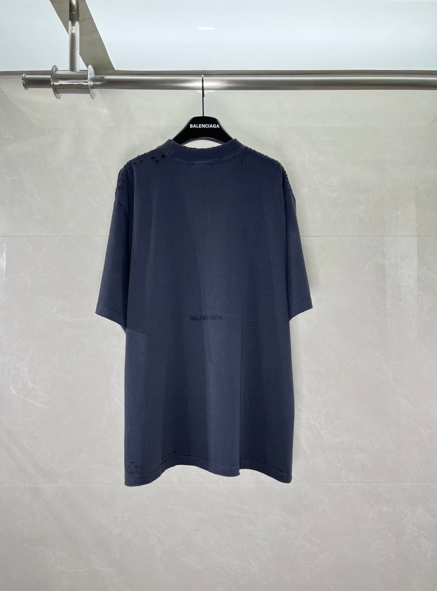 Navy Balenciaga crewneck T-shirt with small center-back text graphic