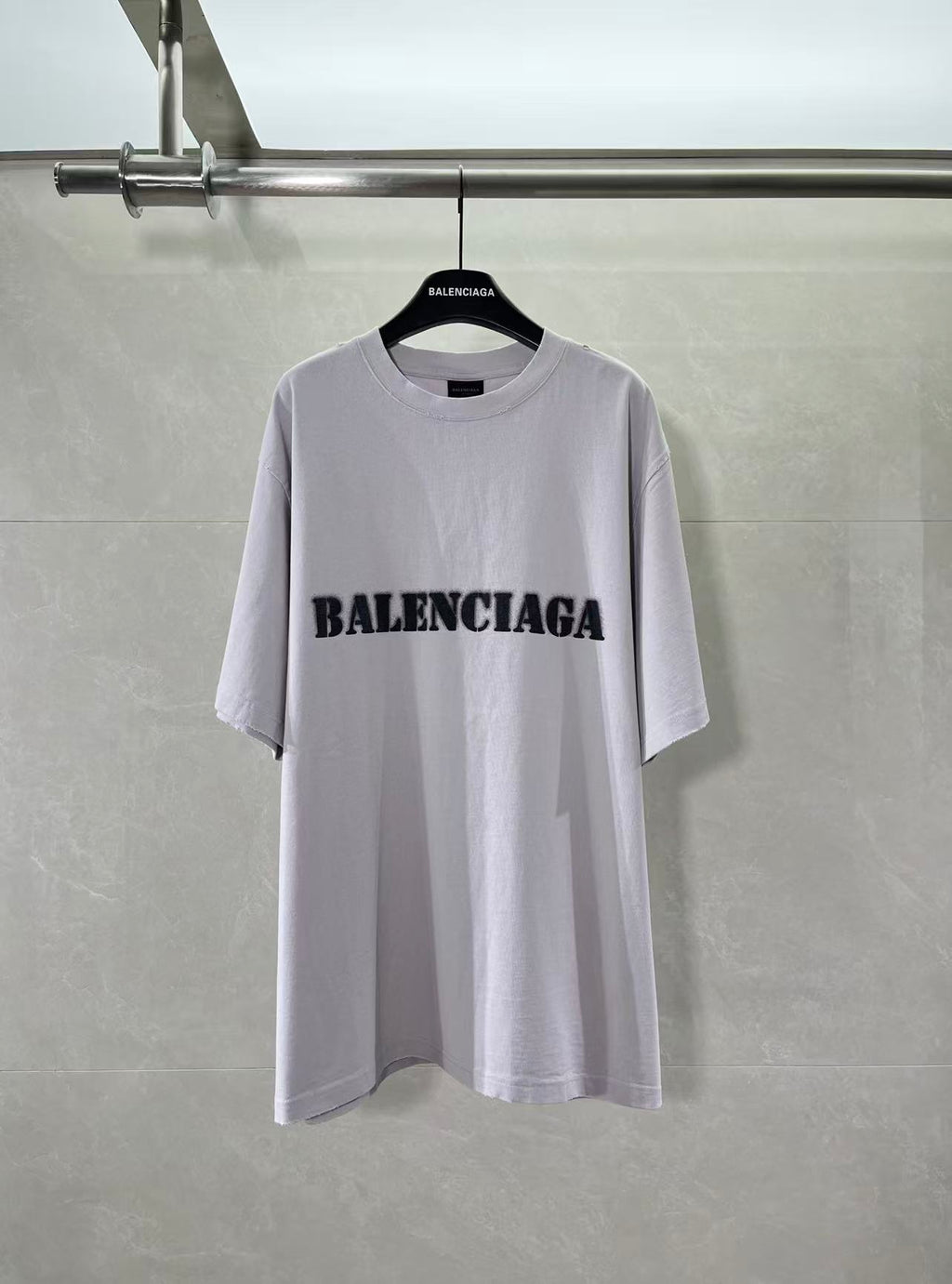 Light lavender Balenciaga T-shirt with black chest logo print, crew neck