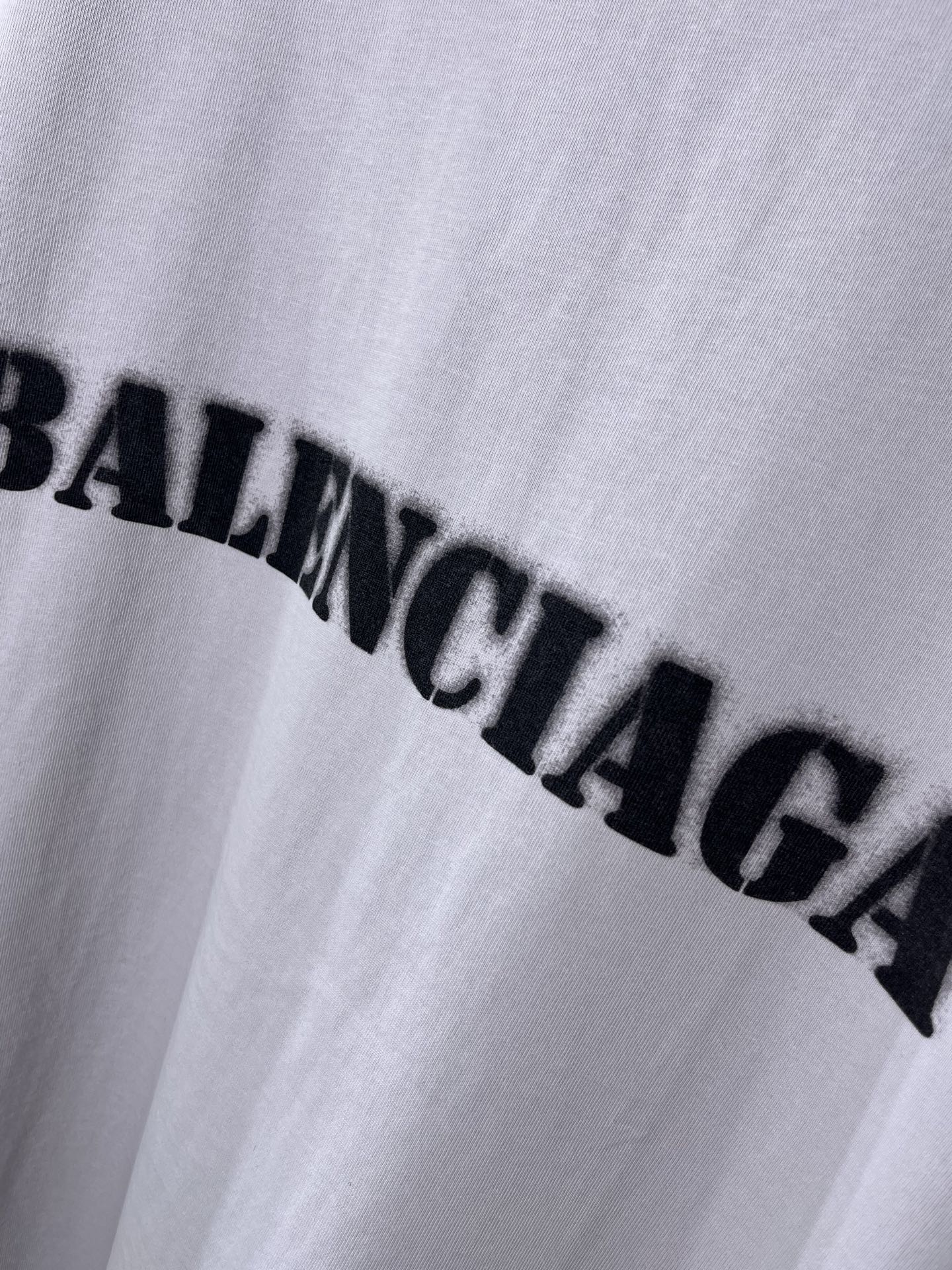 Light lavender Balenciaga T-shirt with curved banded black logo print