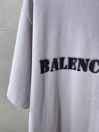 Light lavender Balenciaga T-shirt sleeve with partial black logo print