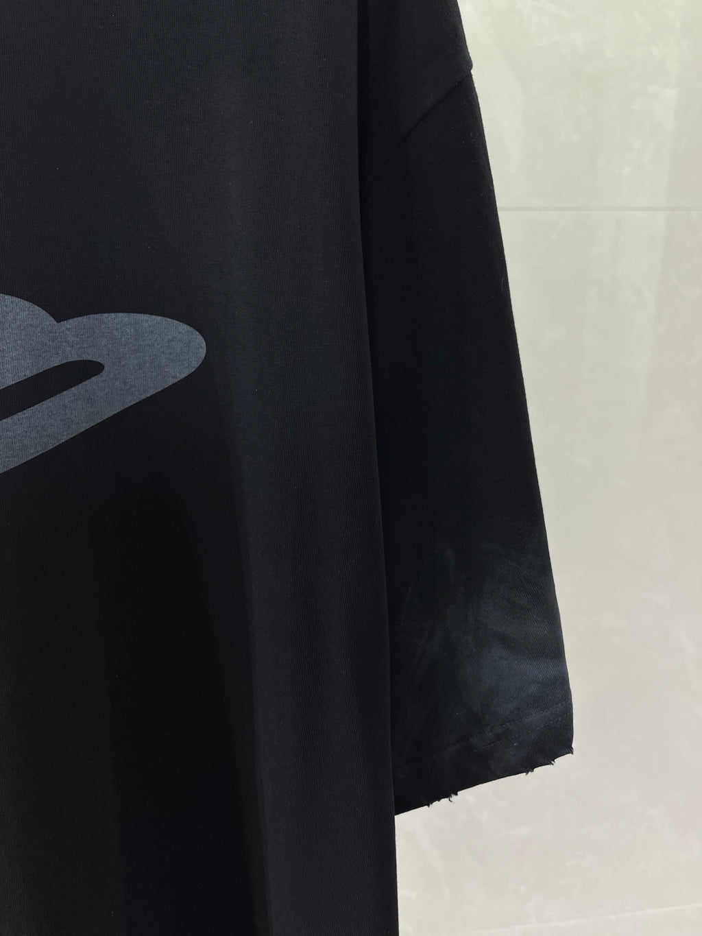 Balenciaga dark navy T-shirt hem and sleeve with partial logo print