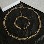 Gold chain necklace and bracelet with linked links and Dior clasp
