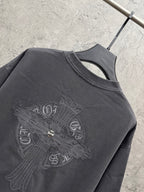 Dark gray crew-neck T-shirt with large winged cross embroidery detail
