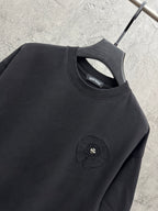 Dark short-sleeve crewneck T-shirt with logo patch and ribbed collar