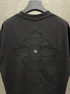 Back view of dark crewneck short-sleeve T-shirt with central embroidered cross