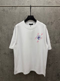 White graphic T-shirt with colorful cross-style front print