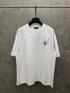 White graphic T-shirt with colorful cross-style front print