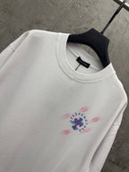 White T-shirt with crew neck and small chest graphic print