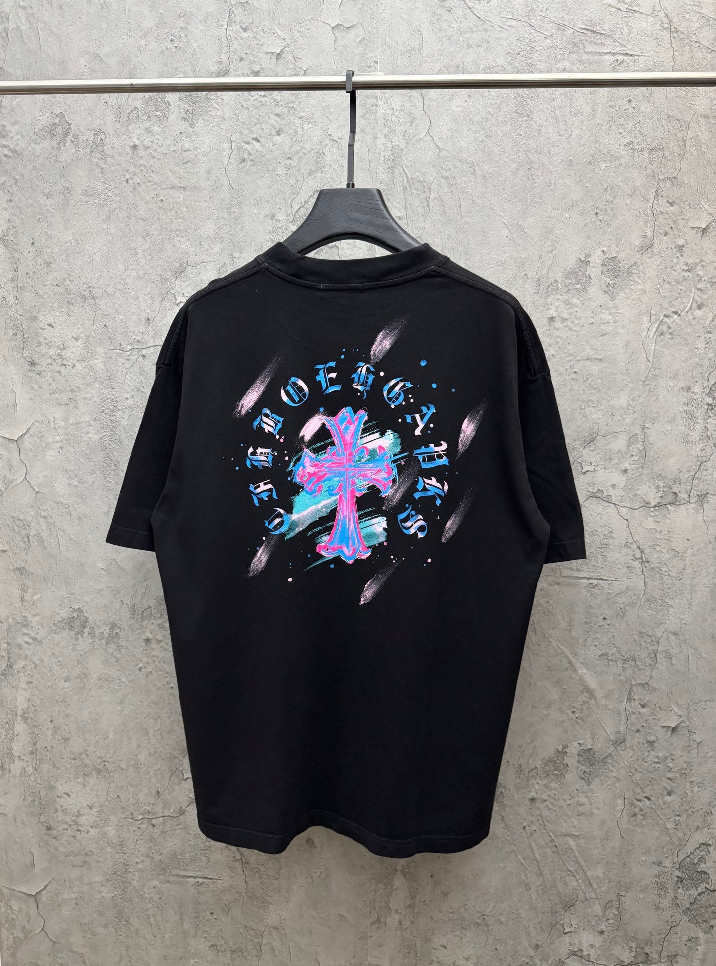 Black short-sleeve T-shirt with large neon music graphic on back