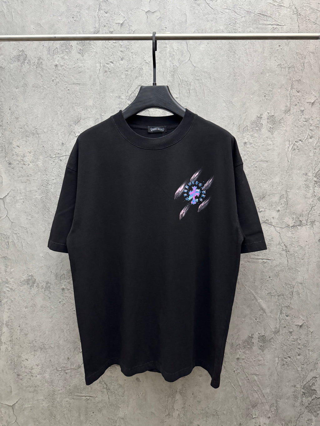 Black short-sleeve T-shirt with neon music graphic on chest