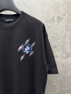 Black short-sleeve T-shirt with small neon music graphic