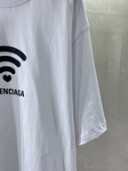 White Balenciaga T-shirt front hem with partial Wi-Fi heart graphic and logo