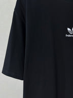Short-sleeve T-shirt side view with white logo marking and sleeve stripe detail