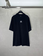 Short-sleeve T-shirt in dark navy/black with white logo and three stripe accents