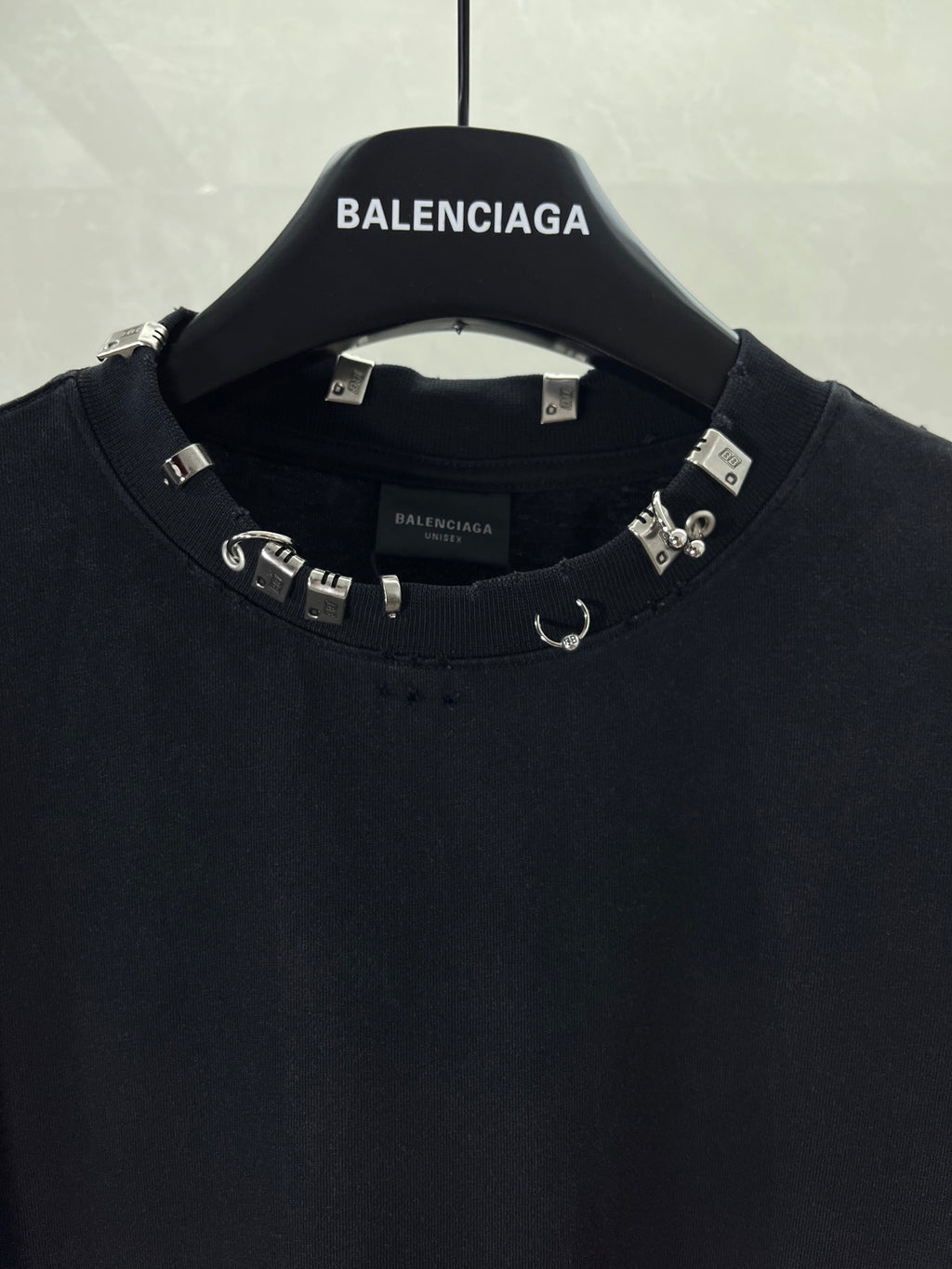 Balenciaga black crewneck top with logo-strap collar embellishments