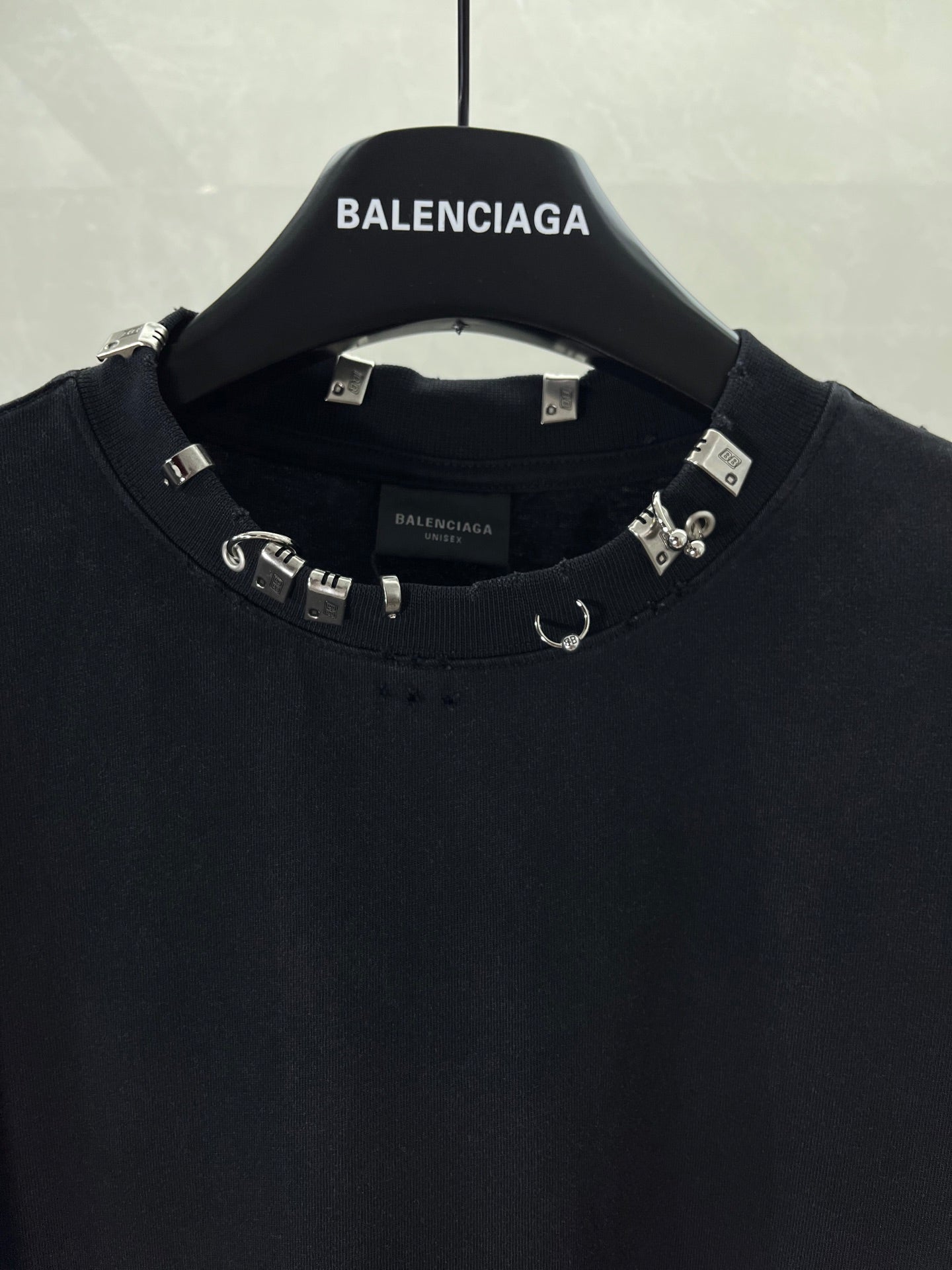Balenciaga black crewneck top with logo-strap collar embellishments