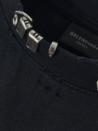 Balenciaga black crewneck top with metal tag and buckle hardware