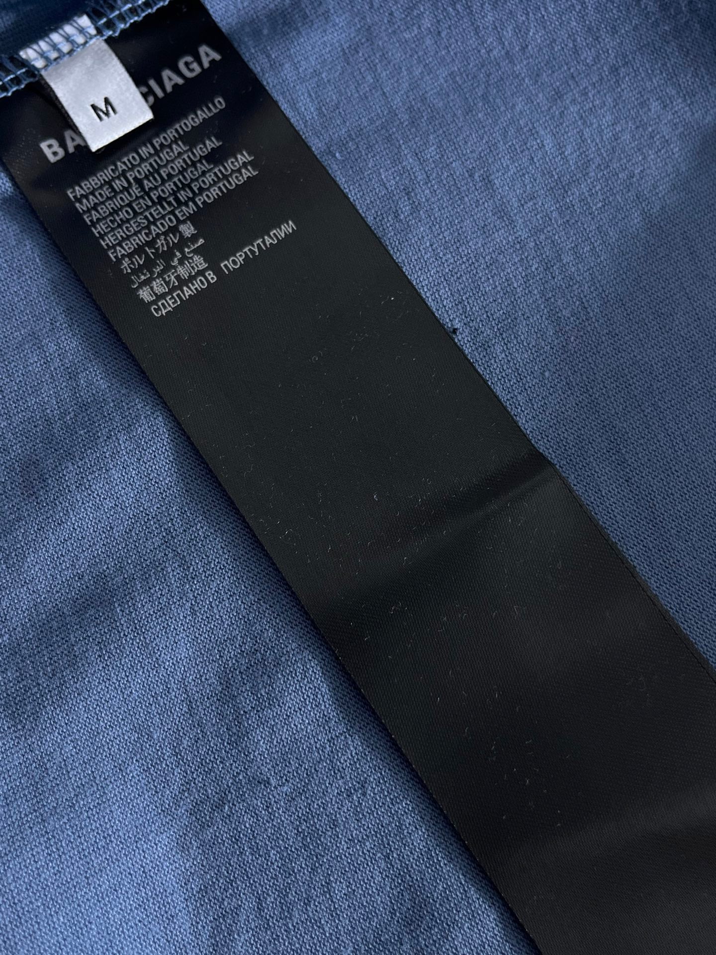 Balenciaga light blue T-shirt fabric label tag on inner neck
