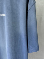 Balenciaga light blue T-shirt sleeve and hem detail with logo print