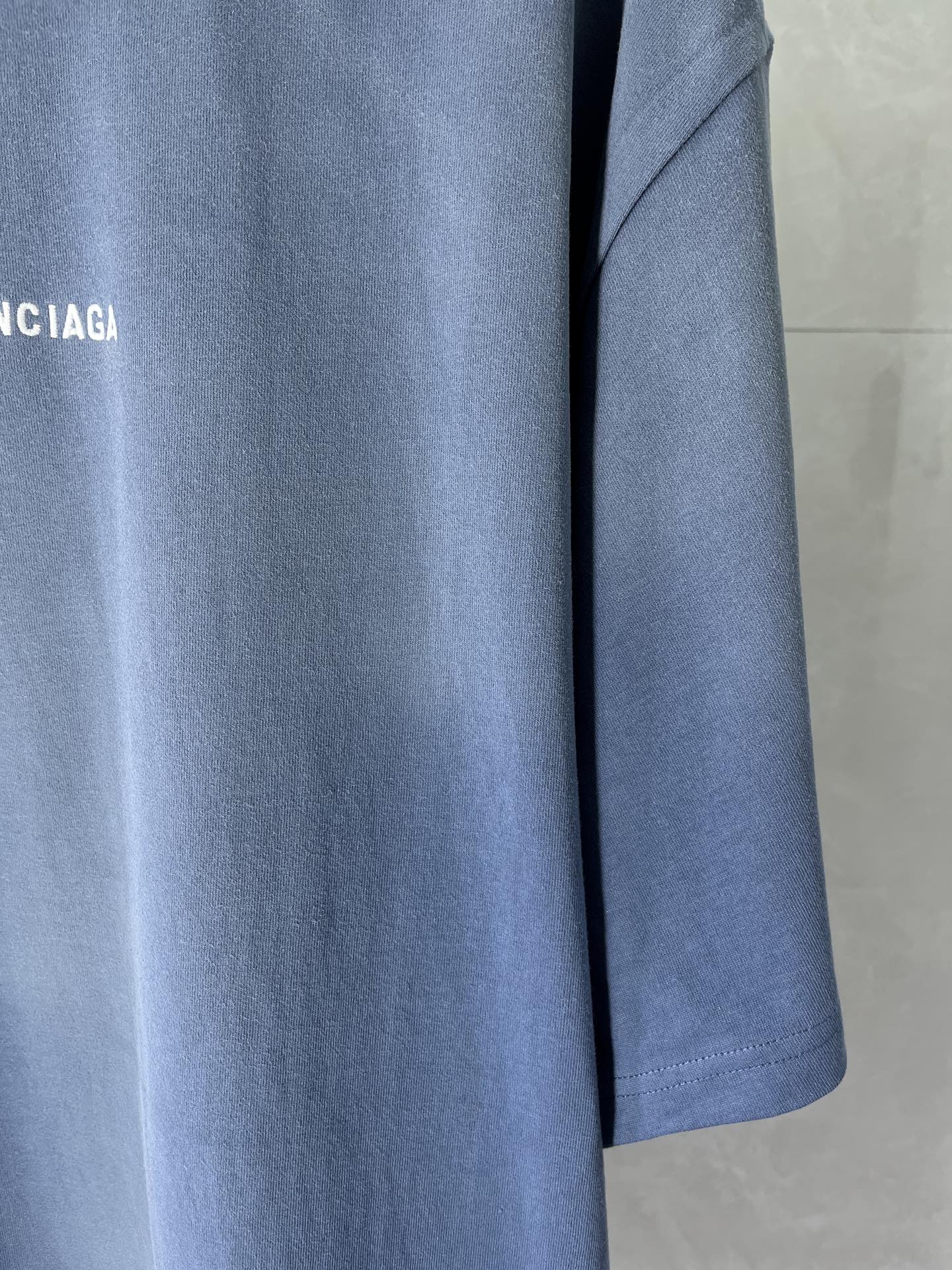 Balenciaga light blue T-shirt sleeve and hem detail with logo print