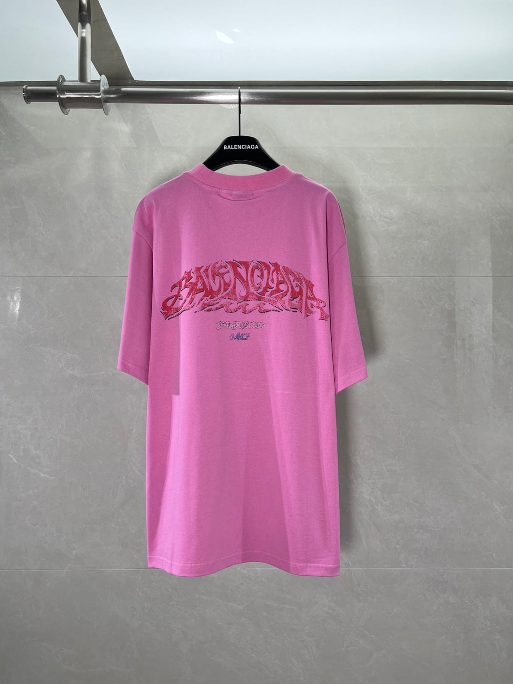 Pink Balenciaga graphic T-shirt with crew neck and short sleeves, back view