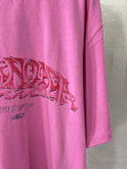 Pink Balenciaga T-shirt with red graphic print on the front and short sleeve