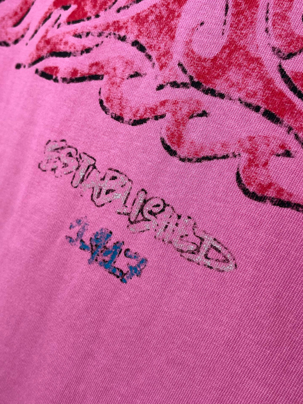 Pink Balenciaga T-shirt with detailed red script graphic print